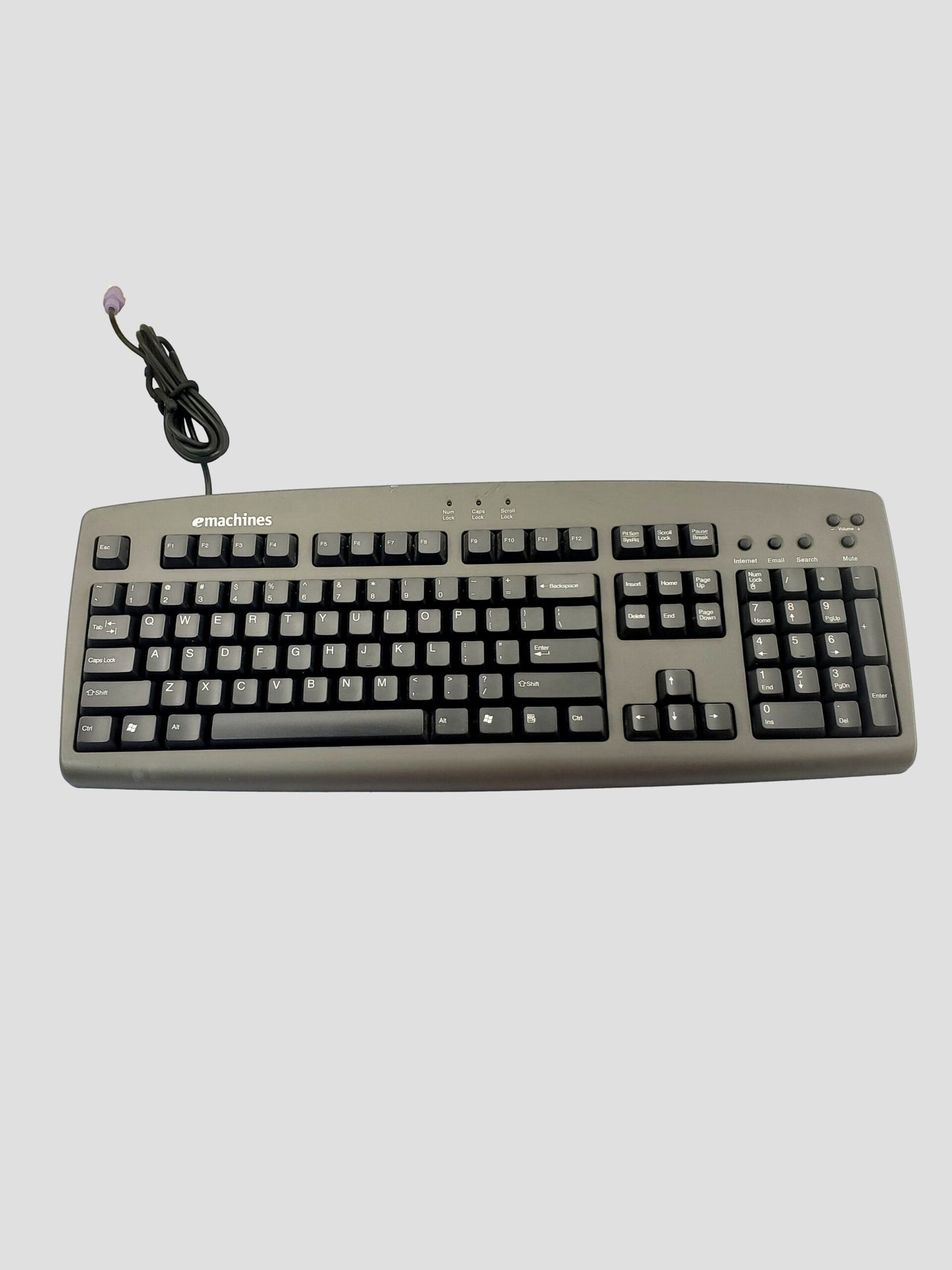 Emachines: Model #5143 wired Computer Keyboard with attached purple PS/2 plug