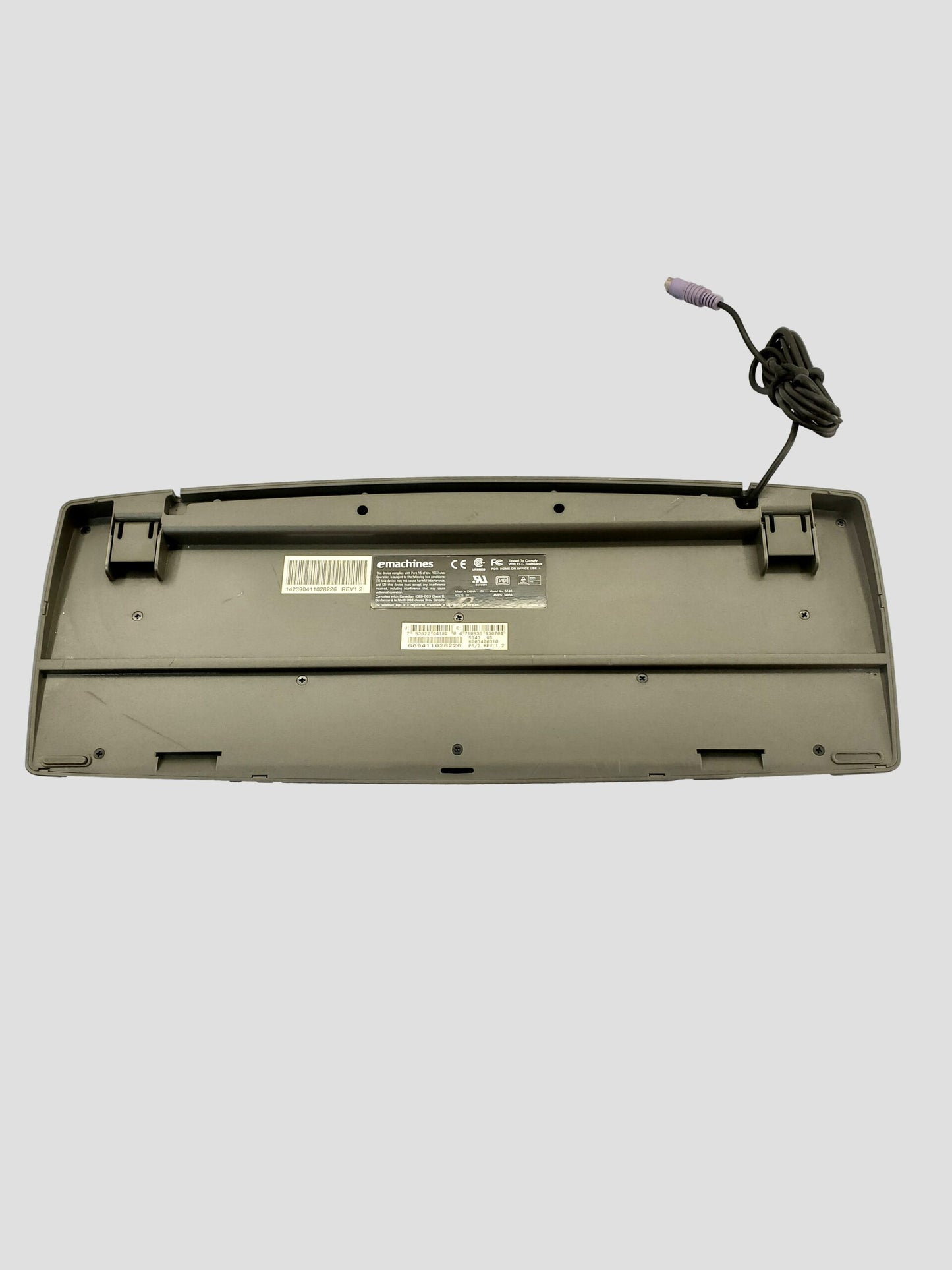 Emachines: Model #5143 wired Computer Keyboard with attached purple PS/2 plug