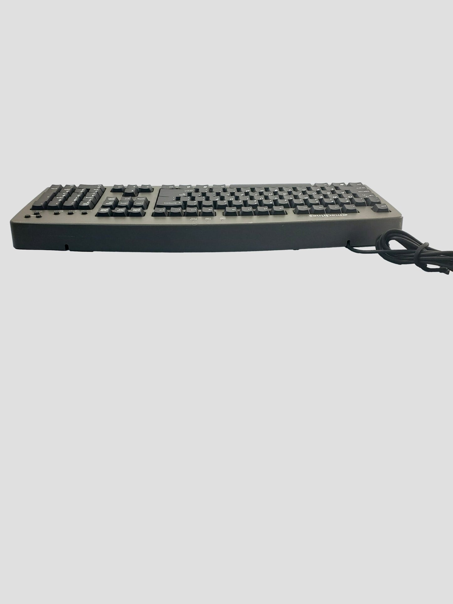 Emachines: Model #5143 wired Computer Keyboard with attached purple PS/2 plug