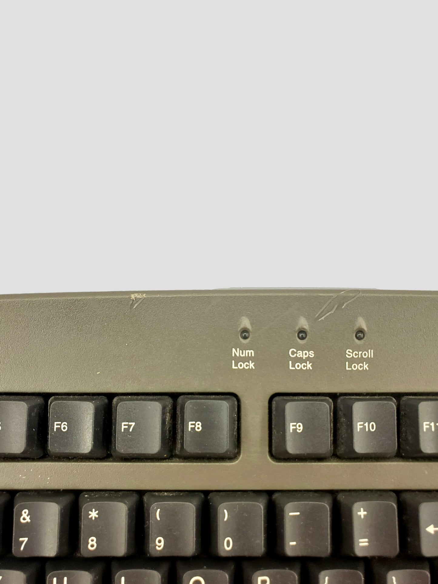 Emachines: Model #5143 wired Computer Keyboard with attached purple PS/2 plug