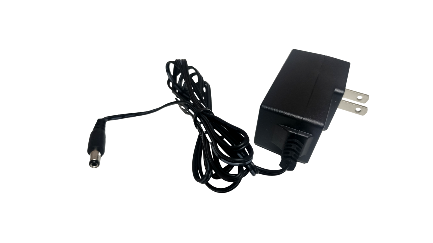 Shenzhen Heweishun Model: TEA09U-09060 9V - 0.6mA Switching Adapter