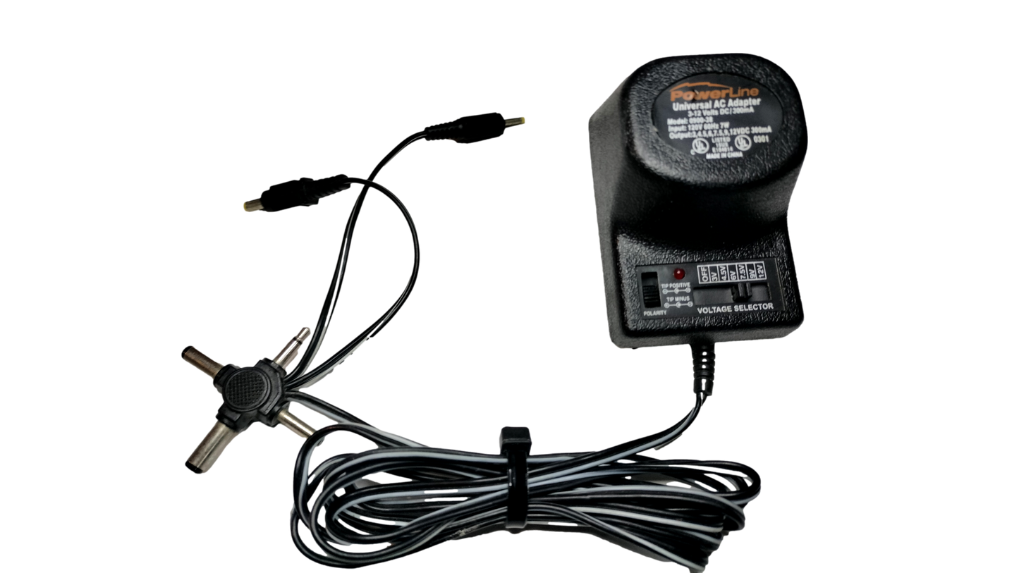 Powerline Universal AC Adapter Voltage Selector from 3 VDC -12 VDC Model 0900-38
