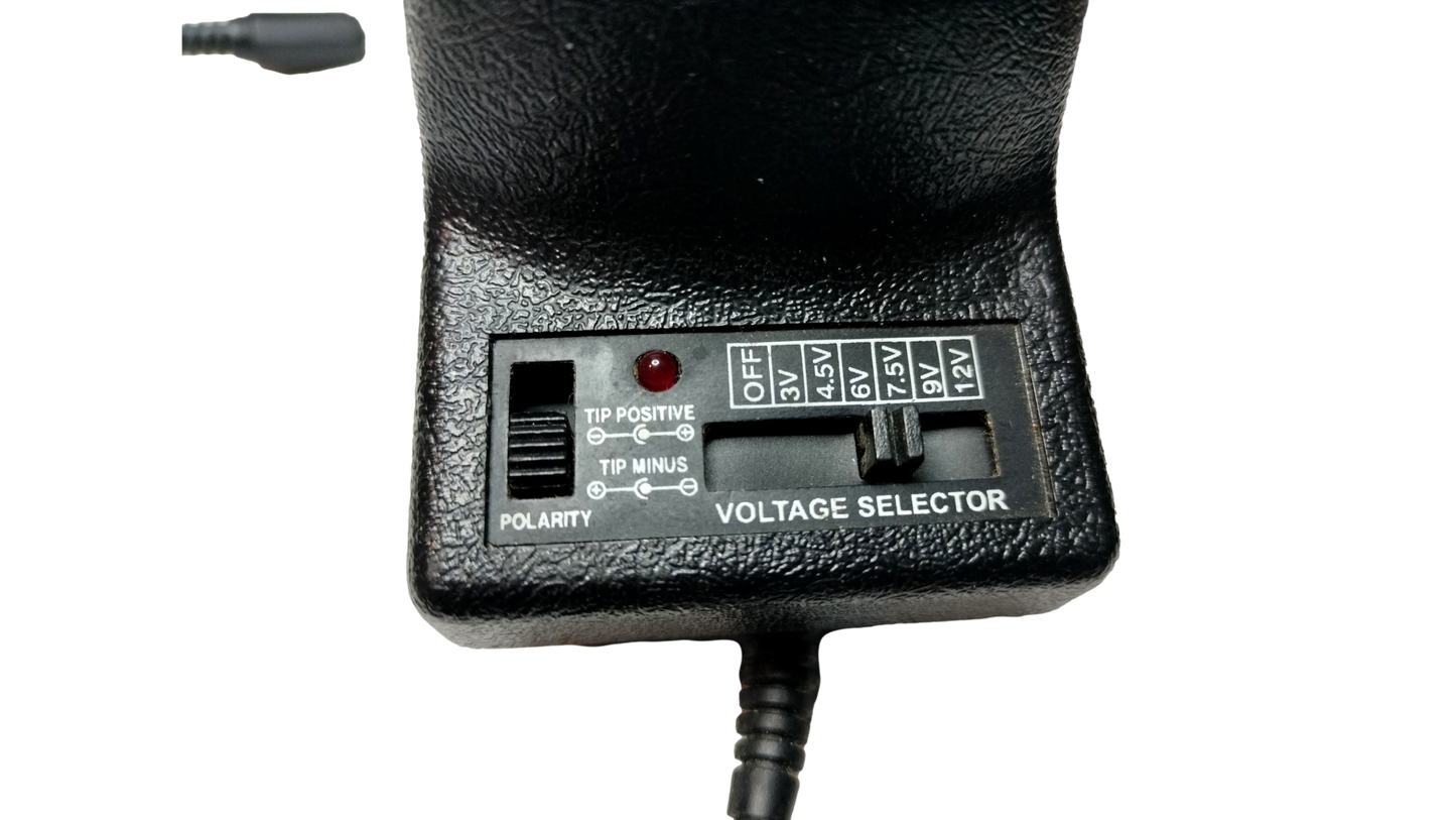 Powerline Universal AC Adapter Voltage Selector from 3 VDC -12 VDC Model 0900-38